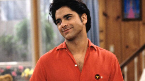 John Stamos bald cap gesture controversy